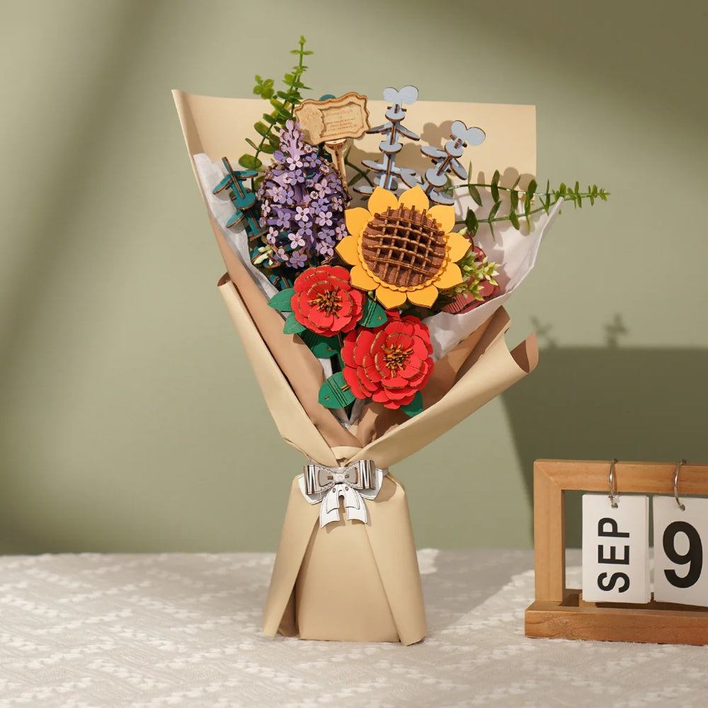 Rowood Wooden Flower Bouquet TW01H displayed as a handcrafted wooden bouquet with sunflower, lilac, red camellia, and pink rose in a lifestyle setting.