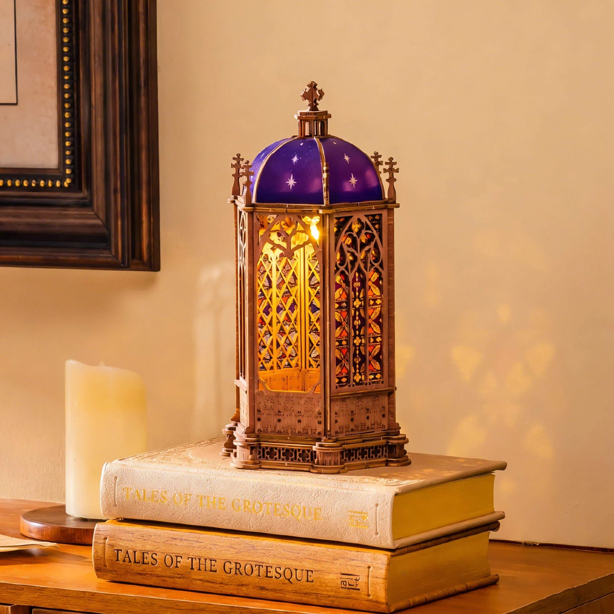 Rolife Starry Dome Cathedral TGA02 displayed as a warm glowing night light on books