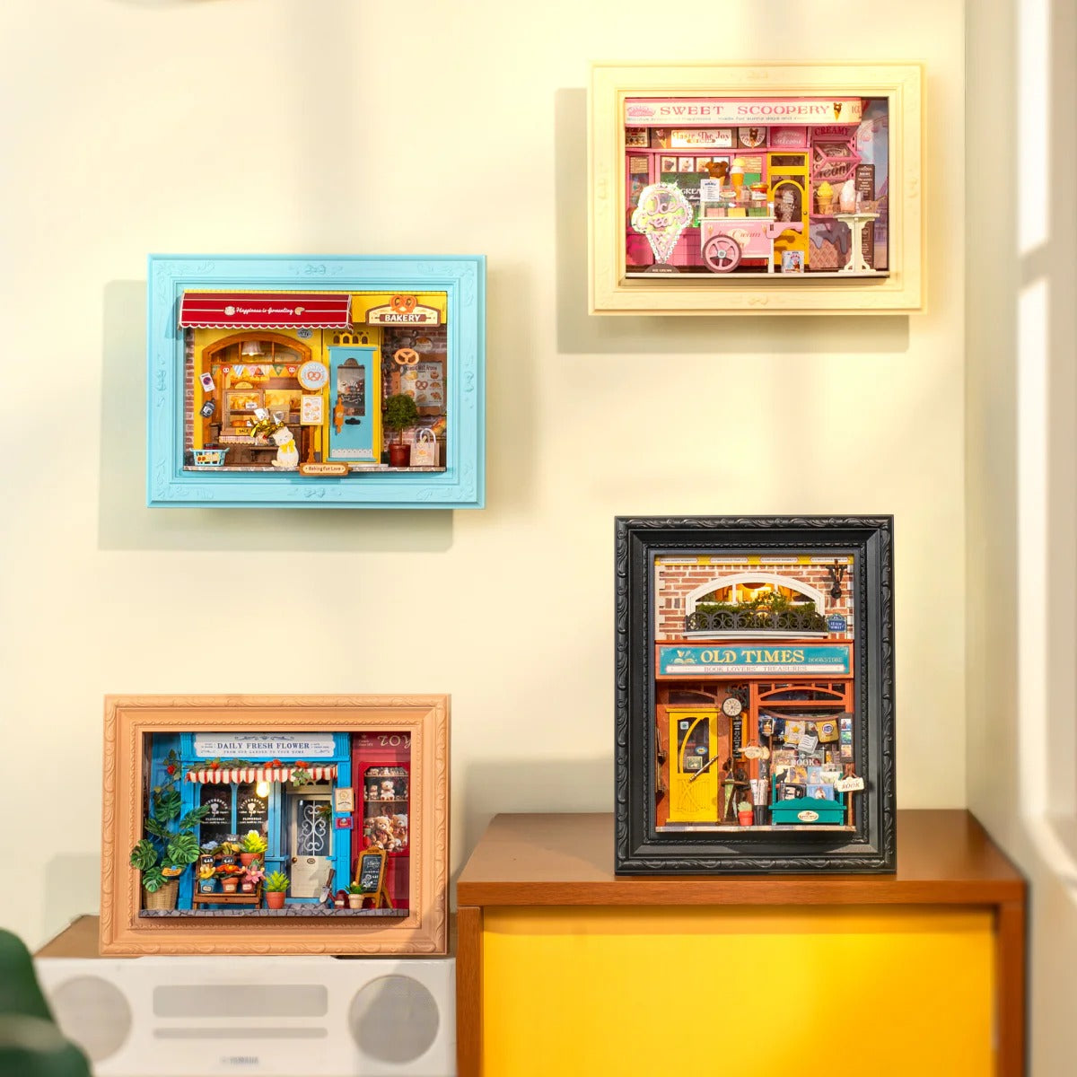 Rolife Old Times Bookstore DP004 shown with other Rolife story frame models as wall and shelf decor