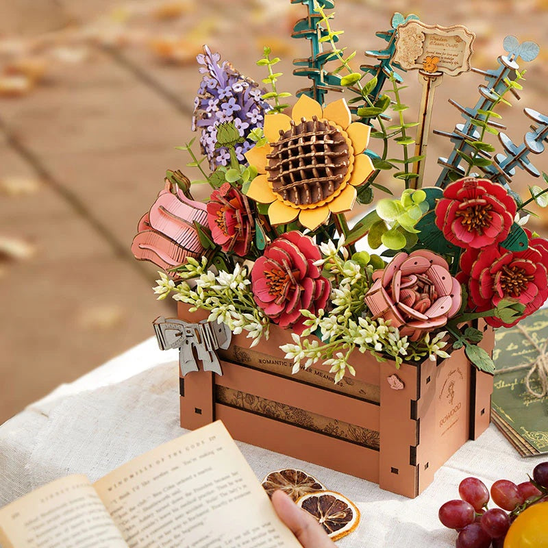 Rowood Wooden Bloom Box TW02H displayed outdoors in an autumn-inspired lifestyle scene with books and fruit