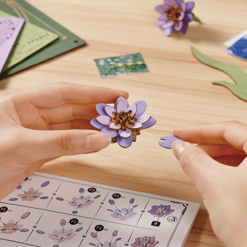 Close-up assembly of a purple water lily flower for Rowood Glittering Water Lily TH001
