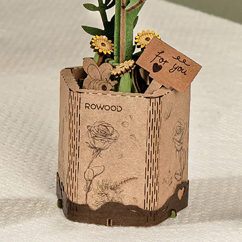 Close-up of the Rowood Wooden Bloom Craft kraft paper pot and decorative card detail
