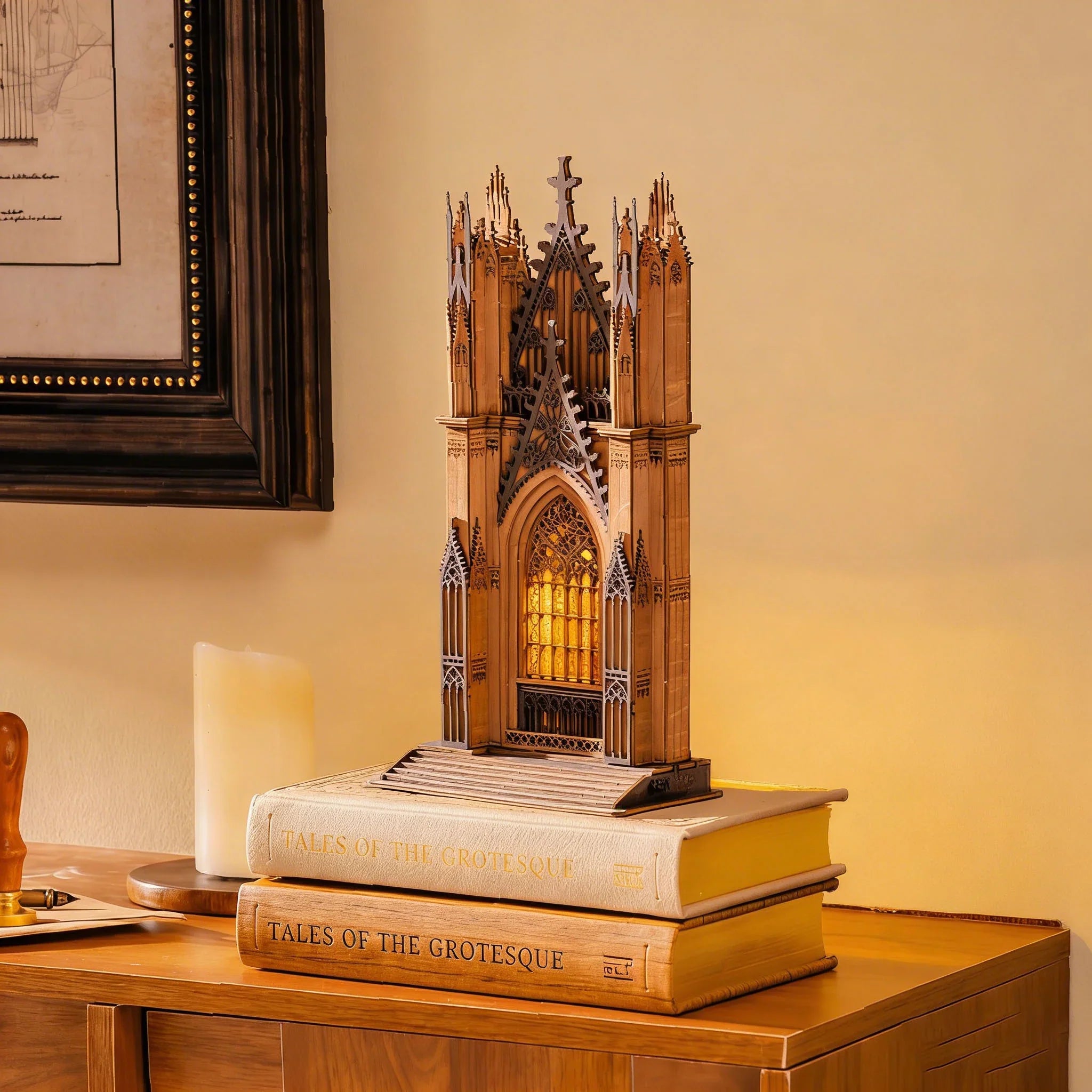 Rolife Twin-Tower Cathedral TGA01 displayed on books with warm glowing cathedral light